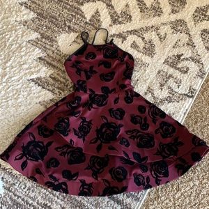 Q Backless Dress with Crisscrossed back Straps in Maroon and Black velvet flower